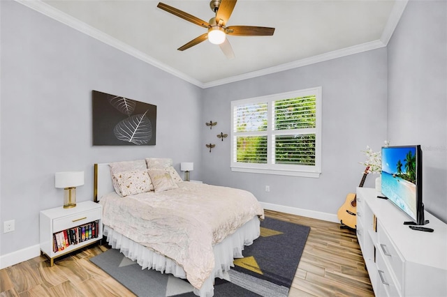 3379 Chestertown Loop, Bradenton, FL 34211 - bedroom with wood finished floors, ornamental molding, and a ceiling fan