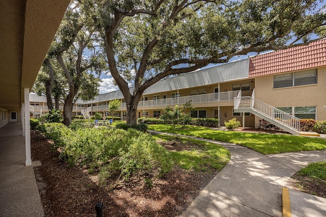 10037 62nd Ter N Unit 23, Saint Petersburg, FL 33708 - surrounding community with stairs