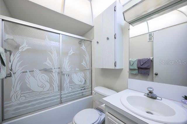 10037 62nd Ter N Unit 23, Saint Petersburg, FL 33708 - bathroom featuring vanity and enclosed tub / shower combo