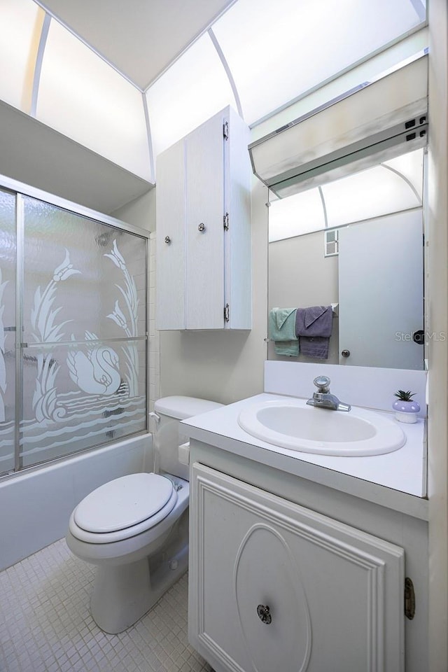10037 62nd Ter N Unit 23, Saint Petersburg, FL 33708 - full bathroom featuring vanity, enclosed tub / shower combo, and tile patterned floors