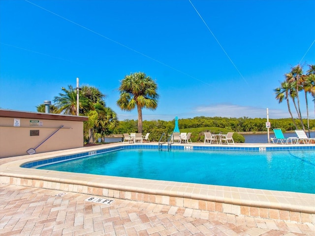 10037 62nd Ter N Unit 23, Saint Petersburg, FL 33708 - community pool with a patio