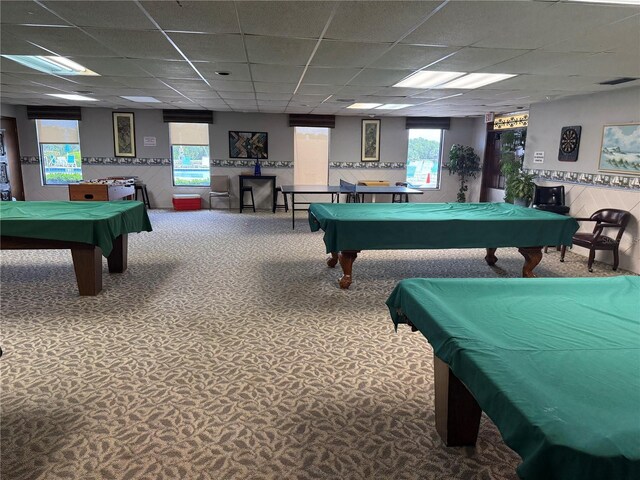 10037 62nd Ter N Unit 23, Saint Petersburg, FL 33708 - game room featuring billiards, a paneled ceiling, carpet flooring, and healthy amount of natural light