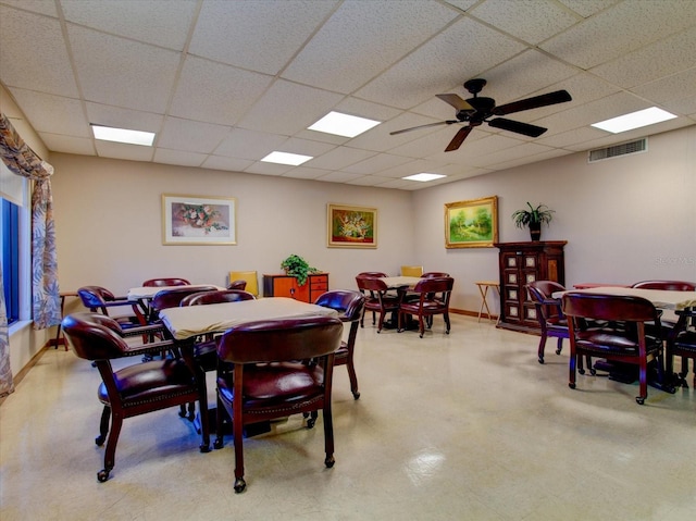10037 62nd Ter N Unit 23, Saint Petersburg, FL 33708 - dining space with a drop ceiling and a ceiling fan