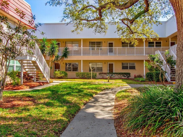 10037 62nd Ter N Unit 23, Saint Petersburg, FL 33708 - view of property with stairway