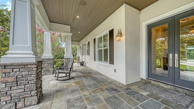 6050 Saddle Oak Trl, Sarasota, FL 34241 - porch with french doors