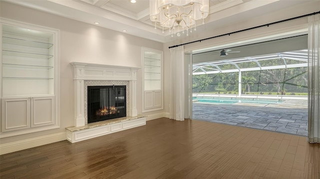 6050 Saddle Oak Trl, Sarasota, FL 34241 - unfurnished living room featuring a sunroom, coffered ceiling, dark wood-style flooring, beam ceiling, and a ceiling fan