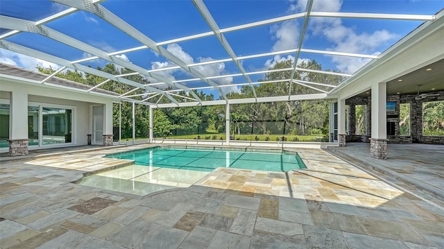 6050 Saddle Oak Trl, Sarasota, FL 34241 - swimming pool featuring a patio area and glass enclosure