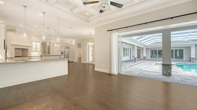 6050 Saddle Oak Trl, Sarasota, FL 34241 - unfurnished living room with ornamental molding, beamed ceiling, dark wood-style floors, coffered ceiling, and ceiling fan