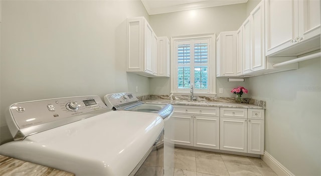 6050 Saddle Oak Trl, Sarasota, FL 34241 - laundry area with cabinet space, washing machine and clothes dryer, and crown molding