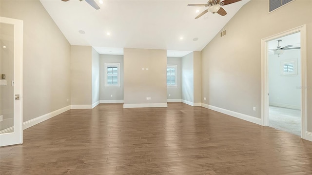 6050 Saddle Oak Trl, Sarasota, FL 34241 - spare room featuring a ceiling fan, vaulted ceiling, wood finished floors, and recessed lighting