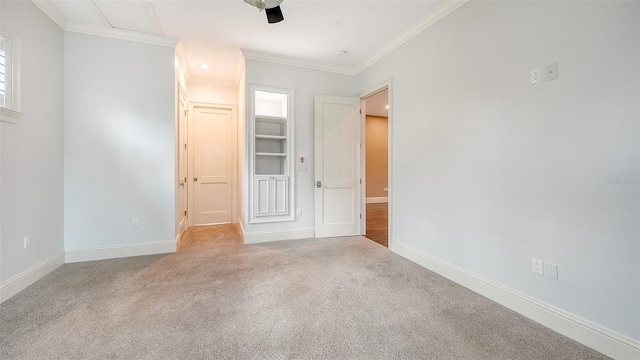 6050 Saddle Oak Trl, Sarasota, FL 34241 - unfurnished bedroom featuring ornamental molding and carpet