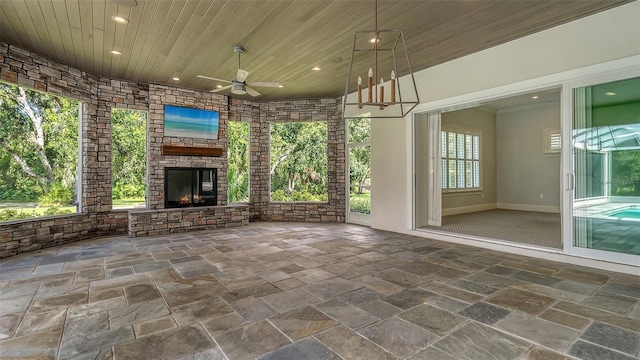 6050 Saddle Oak Trl, Sarasota, FL 34241 - view of patio / terrace with an outdoor stone fireplace and ceiling fan