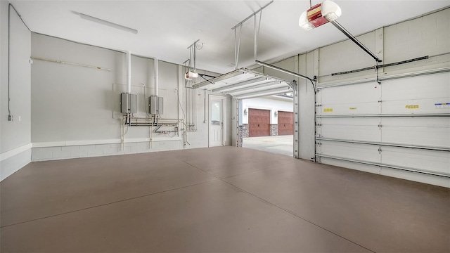 6050 Saddle Oak Trl, Sarasota, FL 34241 - garage featuring a garage door opener