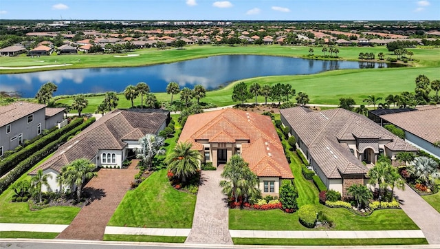 5104 Benito Ct, Bradenton, FL 34211 - aerial view of residential area featuring a local golf course and a nearby body of water