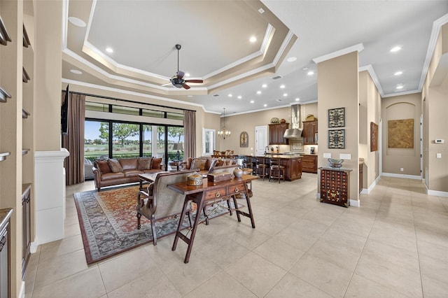 5104 Benito Ct, Bradenton, FL 34211 - living room featuring ornamental molding, a raised ceiling, a ceiling fan, light tile patterned floors, and recessed lighting
