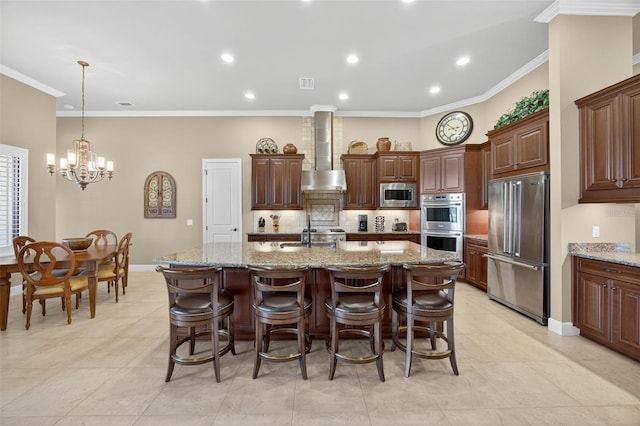 5104 Benito Ct, Bradenton, FL 34211 - kitchen featuring appliances with stainless steel finishes, wall chimney range hood, tasteful backsplash, crown molding, and a chandelier