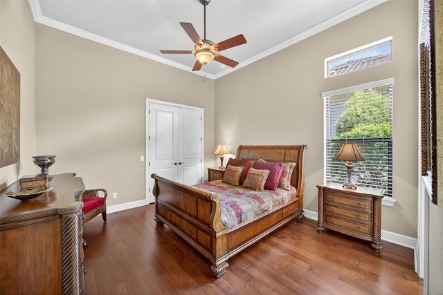 5104 Benito Ct, Bradenton, FL 34211 - bedroom featuring wood finished floors, ornamental molding, a closet, and a ceiling fan