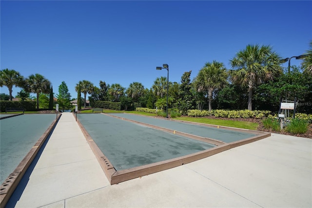 5104 Benito Ct, Bradenton, FL 34211 - view of property's community with a game area and view of wooded area