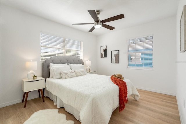 2802 21st St W, Bradenton, FL 34205 - bedroom with light wood finished floors and a ceiling fan