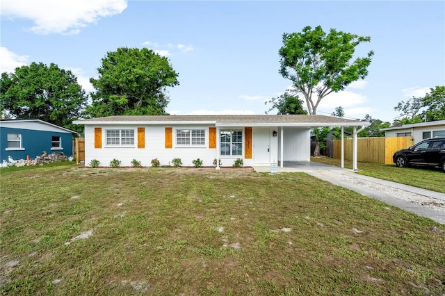2802 21st St W, Bradenton, FL 34205 - single story home with concrete driveway and an attached carport