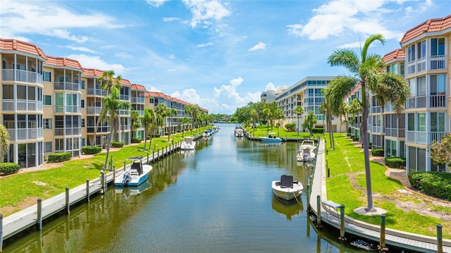 1257 S Portofino Dr Unit 306, Sarasota, FL 34242 - water view with a boat dock