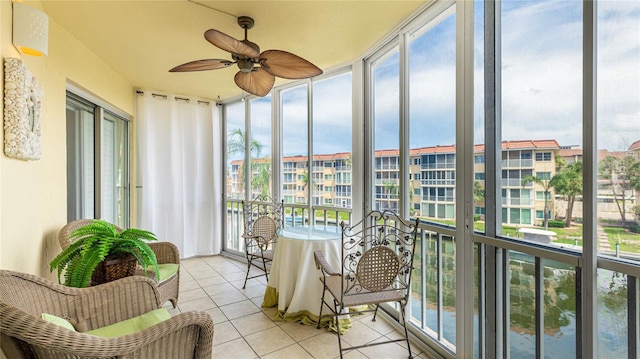 1257 S Portofino Dr Unit 306, Sarasota, FL 34242 - sunroom / solarium with tile patterned flooring and a wall of windows