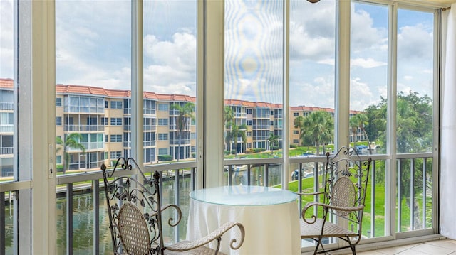 1257 S Portofino Dr Unit 306, Sarasota, FL 34242 - sunroom with a water view