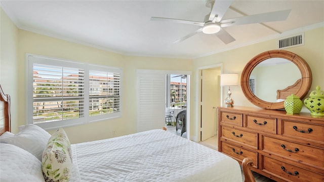 1257 S Portofino Dr Unit 306, Sarasota, FL 34242 - bedroom with crown molding and a ceiling fan