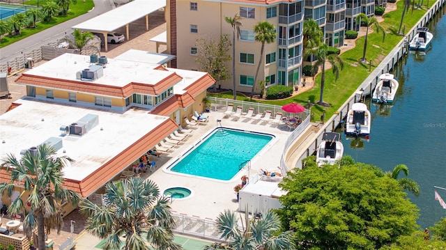 1257 S Portofino Dr Unit 306, Sarasota, FL 34242 - aerial view of a pool area and a nearby body of water