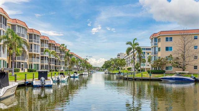 1257 S Portofino Dr Unit 306, Sarasota, FL 34242 - water view featuring a dock