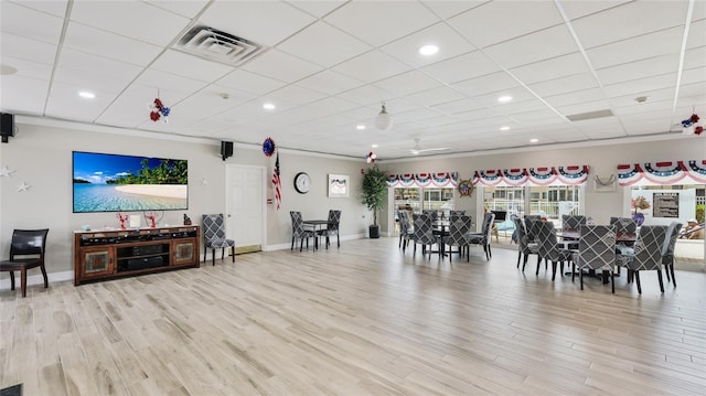 1257 S Portofino Dr Unit 306, Sarasota, FL 34242 - dining space with light wood-style flooring, crown molding, and recessed lighting
