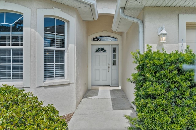1042 Whitegate Ct, Sarasota, FL 34232 - entrance to property featuring stucco siding