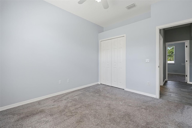 1042 Whitegate Ct, Sarasota, FL 34232 - unfurnished bedroom featuring carpet flooring, a closet, and a ceiling fan
