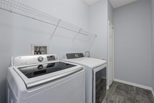 1042 Whitegate Ct, Sarasota, FL 34232 - washroom with washing machine and dryer and baseboards