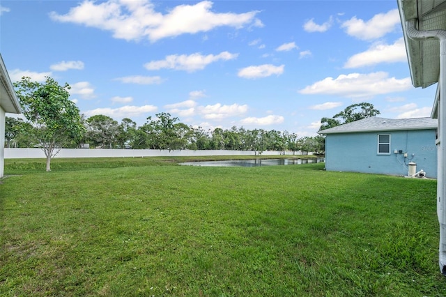 1042 Whitegate Ct, Sarasota, FL 34232 - view of green lawn featuring a water view