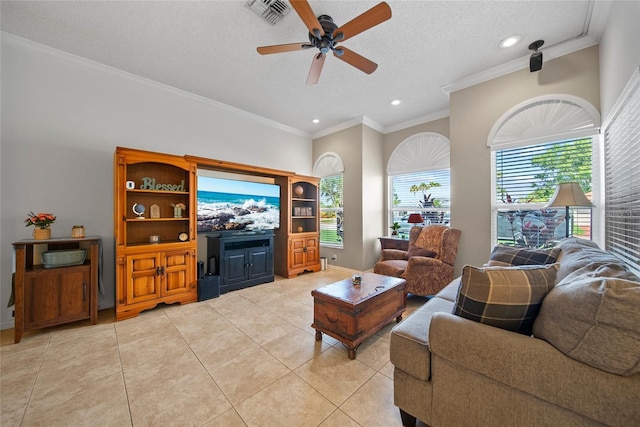 7115 39th Ln E, Sarasota, FL 34243 - living area featuring ceiling fan, recessed lighting, a textured ceiling, light tile patterned floors, and ornamental molding