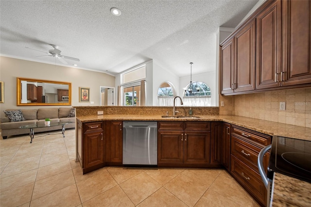 7115 39th Ln E, Sarasota, FL 34243 - kitchen with dishwasher, range with electric cooktop, ceiling fan, a textured ceiling, and light stone countertops