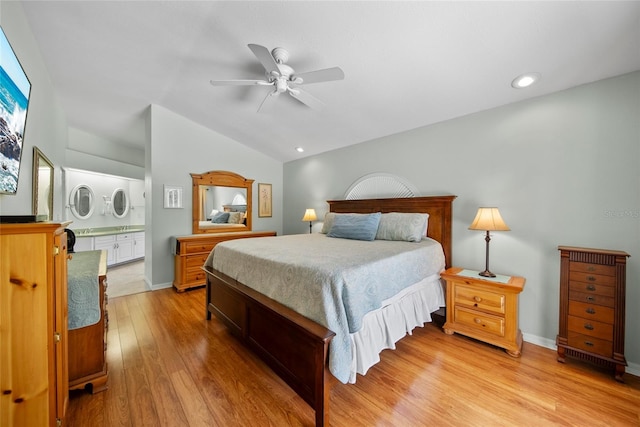 7115 39th Ln E, Sarasota, FL 34243 - bedroom featuring lofted ceiling, light wood finished floors, recessed lighting, connected bathroom, and ceiling fan