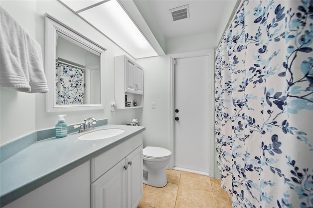 7115 39th Ln E, Sarasota, FL 34243 - bathroom with vanity, tile patterned flooring, and curtained shower