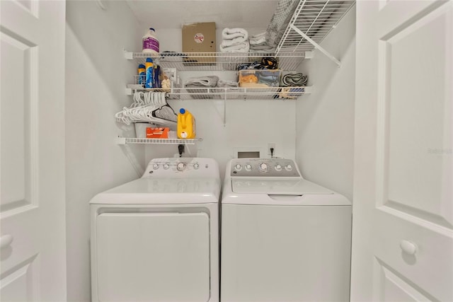 7115 39th Ln E, Sarasota, FL 34243 - washroom featuring washing machine and dryer