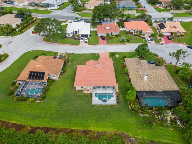 7115 39th Ln E, Sarasota, FL 34243 - aerial view of property and surrounding area with nearby suburban area