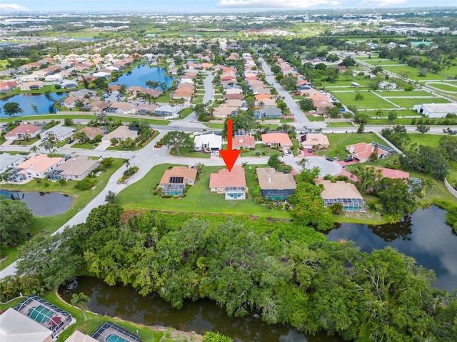 7115 39th Ln E, Sarasota, FL 34243 - aerial overview of property's location featuring a large body of water and nearby suburban area