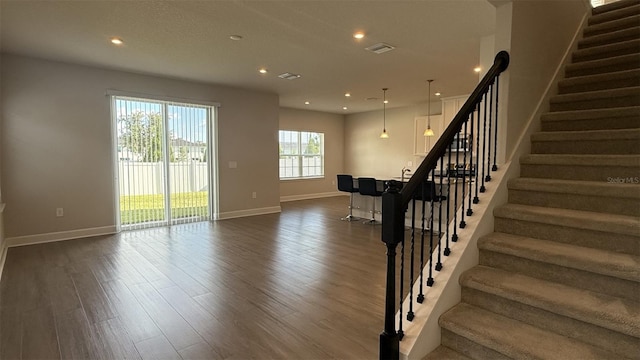 14312 Crimson Ave, Bradenton, FL 34211 - stairs with wood finished floors and recessed lighting