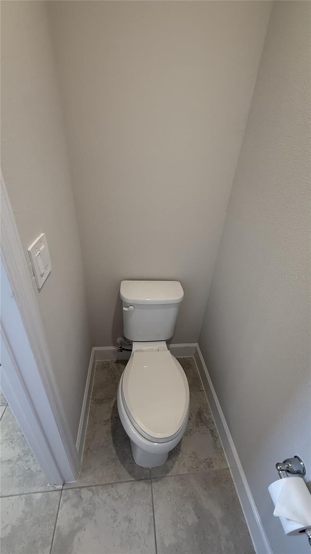 14312 Crimson Ave, Bradenton, FL 34211 - bathroom with toilet and baseboards