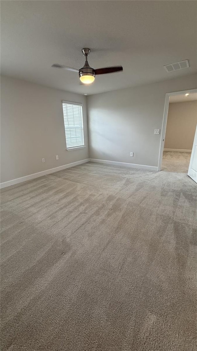 14312 Crimson Ave, Bradenton, FL 34211 - unfurnished room with light colored carpet and ceiling fan