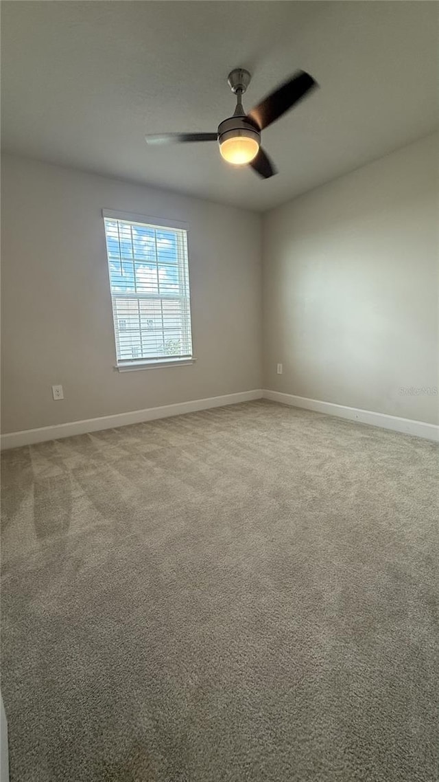 14312 Crimson Ave, Bradenton, FL 34211 - unfurnished room featuring light carpet and ceiling fan