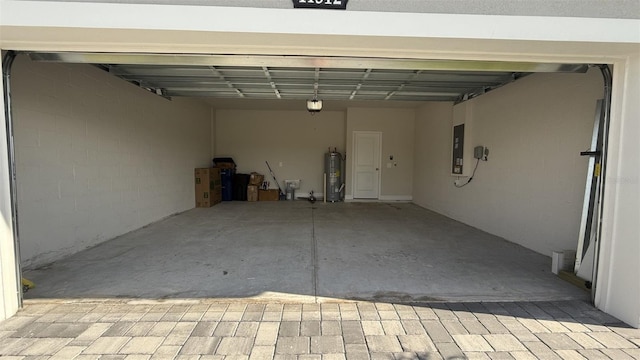 14312 Crimson Ave, Bradenton, FL 34211 - garage with electric water heater, electric panel, and a garage door opener