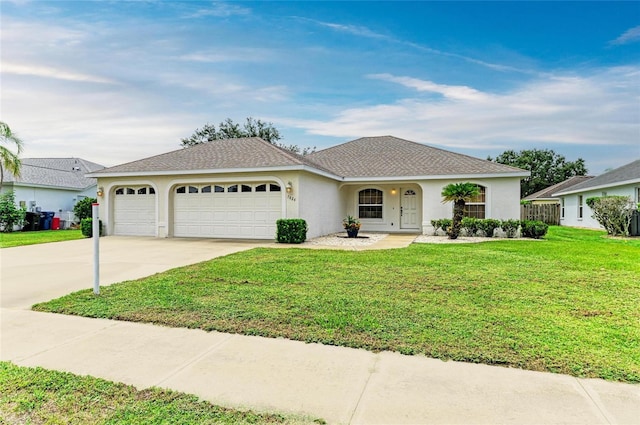 7824 48th Pl E, Bradenton, FL 34203 - ranch-style home featuring an attached garage, stucco siding, concrete driveway, a front yard, and a shingled roof