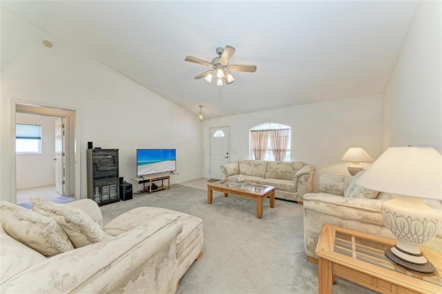 7824 48th Pl E, Bradenton, FL 34203 - living area featuring light colored carpet, ceiling fan, and high vaulted ceiling