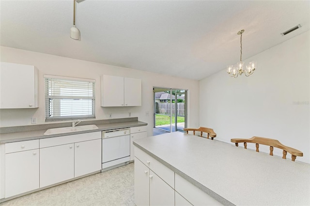 7824 48th Pl E, Bradenton, FL 34203 - kitchen with dishwasher, plenty of natural light, decorative light fixtures, a chandelier, and lofted ceiling